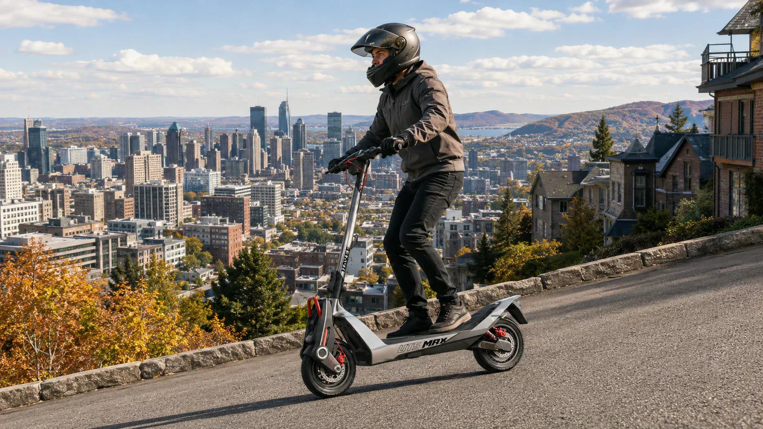 Electric scooter rider climbing a steep Canadian city hill