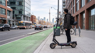Electric scooter parked on a Toronto urban street